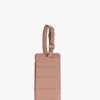 Bagasjelapp i rosa krokodillepreget skinn
