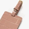 Bagasjelapp i rosa krokodillepreget skinn