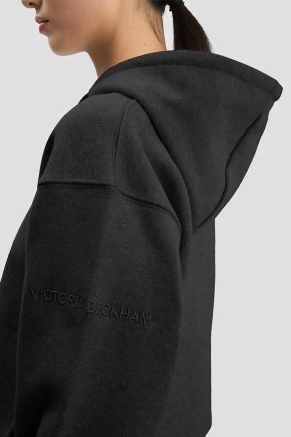 Hettegenser med brodert logo i svart Hettegenser med brodert logo i svart
