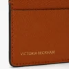 The Victoria-kortholder i brent oransje kornet skinn