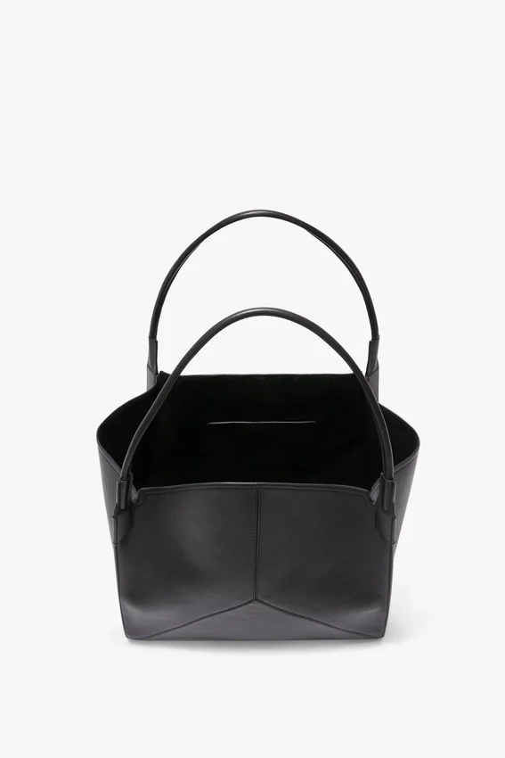 The Victoria tote bag large i svart skinn The Victoria tote bag large i svart skinn