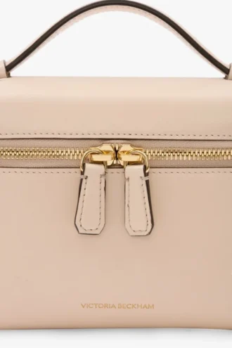Vanity crossbody i blekrosa skinn